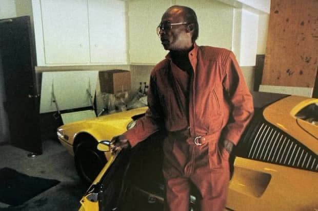 Miles Davis with his 1980 Ferrari 308 GTS.jpg